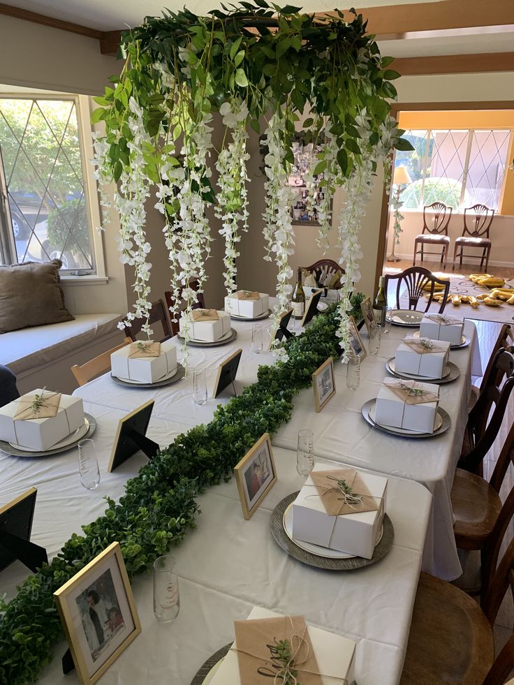 the table is set up with place settings for guests to sit down and enjoy their meal