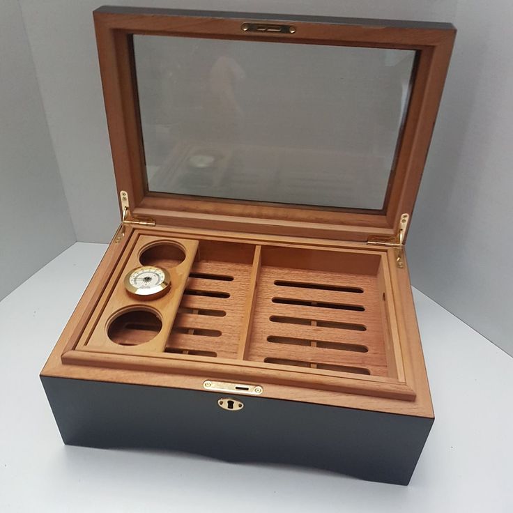 Cedar cigar humidor with a beveled glass top . In really nice condition with barometer and movable partitions to accommodate various sized objects. I do not have the key 14 x 10 x 6 inches I believe it will hold approx 150 cigars Wooden Box Crafts, Movable Partition, Car Part Furniture, Cigars And Whiskey, Humidor, Barometer, Landscape Wallpaper, Beveled Glass, Handmade Furniture