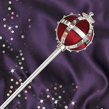 a red and white heart shaped lollipop on a purple satin background with stars