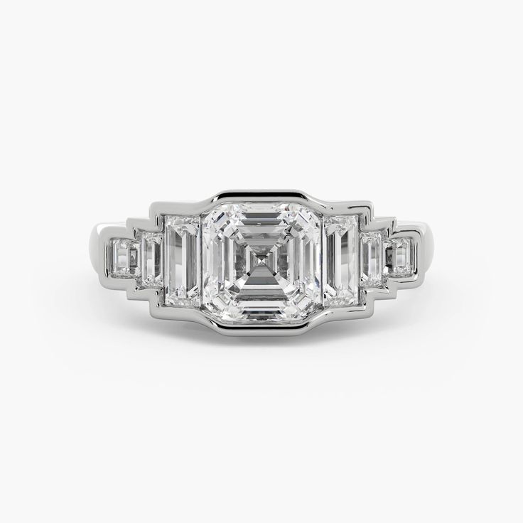 Benedict - Olive Ave Jewelry Timeless Octagon Diamond Ring With Baguette Diamonds, Timeless Octagon Ring With Baguette Diamonds, Timeless Octagon Diamond Ring With Bezel Setting, Luxury Emerald Cut Jewelry With Channel Set, Luxury Jewelry With Emerald Cut And Channel Set, Luxury Octagon Diamond Ring With Baguette Diamonds, Luxury Octagon Baguette Diamond Ring, Timeless Octagon Jewelry With Bezel Setting, Timeless Square Cut Jewelry With Bezel Setting