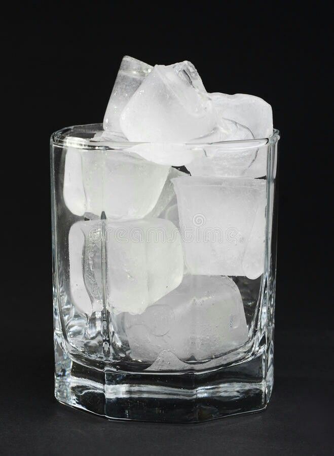 ice cubes in a glass on a black background royalty images and stock photos for free