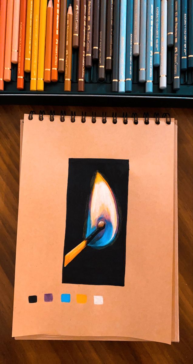 an art project with colored crayons and pencils