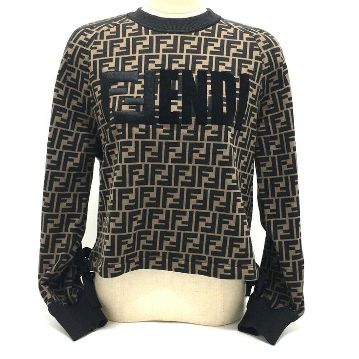 Item Information ITEM NO.: S-210406-59 NAME: FENDI Zucca sweat 19 Cruise Tops trainer SHAPE: Long sleeve sweatshirt pullover apparel MODEL NO.: FS7102 COLOR: Brown MATERIAL: cotton APPROX SIZE: Size description:XXS Shoulder width:35.5cm Dress length:48.5cm Width of a garment:53cm Mid Collar to Sleeve End:70.5cm Sleeve Length:62cm It may be slightly different from the actual size. Gender: Women's ADDITIONAL ITEMS: None ITEM RANK: Used A Rank CONDITION DETAILS: Outside:light stains,Fraying Corners Long Sleeve Sweatshirt, Pullover Sweatshirts, Long Sleeve Sweatshirts, Dress Length, Girl Fashion, Fendi, Long Sleeve Blouse, Sleeve Length, Collar