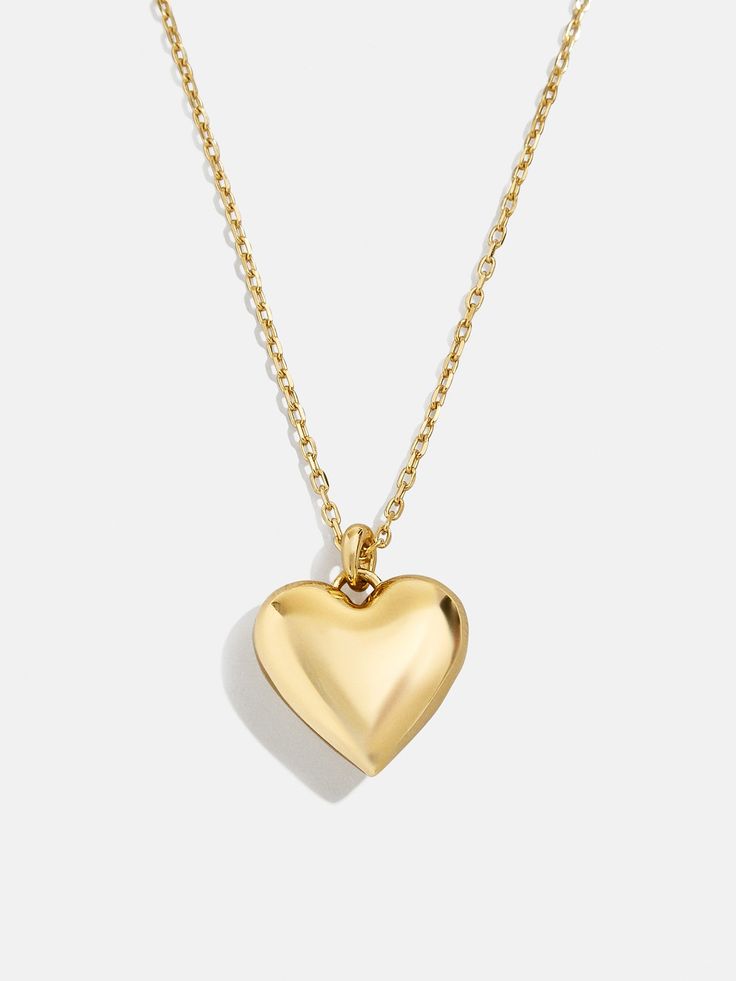 Design a special memento to represent those closest to your heart. The Puffy Heart 18K Gold Custom Pendant Necklace features a three-dimensional heart charm with the option to add 1-4 engraved letters of your choosing. Add the initials of each of the members of your family, you and a few loved ones, or even just your own - the options are endless. Better yet, this piece is crafted with 18K gold plated sterling silver, meaning it'll last you a lifetime. Silver Meaning, Heart Gold Necklace, Heirloom Necklace, Engraved Letters, Silver Braided Ring, Custom Pendant Necklace, Puffy Heart Necklace, Heart Pendant Necklace Gold, Heart Necklace Gold