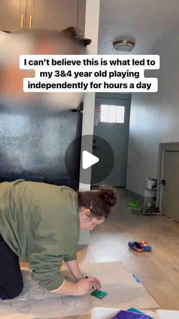 a woman kneeling down on the floor in front of a blackboard with words that read i can't believe this is what led to my 34th year old playing independently for hours