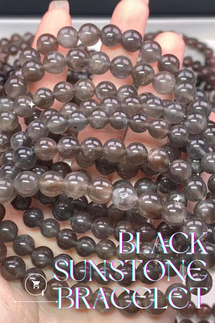 This fashionable Black Sunstone Bead Bracelet is a great way to enhance your look. Crafted from natural black sunstone beads, this bracelet makes a timeless fashion statement. The natural stone beads help to absorb negative energy and aid in emotional balance. Size: 5-11.5mm Affordable Black Crystal Bracelet With Round Beads, Natural Stone Beads, Emotional Balance, Wholesale Beads, Beading Supplies, Negative Energy, Bead Bracelet, Stone Beads, Instagram Followers