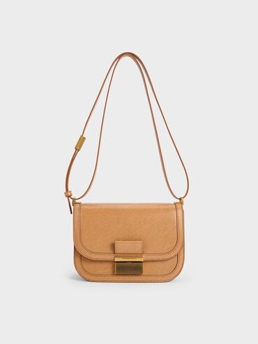 Toffee Charlot Bag | CHARLES & KEITH Modern Brown Flap Bag For On-the-go, Brown Rectangular Flap Bag For On-the-go, Timeless Brown Saddle Bag With Gold-tone Hardware, Elegant Brown Baguette Bag For On-the-go, Versatile Brown Flap Bag For On-the-go, Timeless Brown Shoulder Bag With Removable Pouch, Classic Neutral Formal Bag, Classic Brown Tote Baguette Bag, Chic Textured Leather Bags For Fall