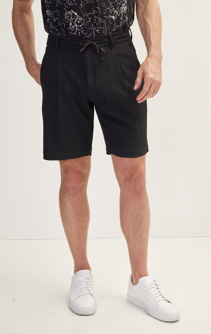 Introducing our Elegant Everyday Shorts, where comfort meets sophistication for effortless style in any setting. Crafted with meticulous attention to detail and made from high-quality materials, these shorts are designed to elevate your casual wardrobe with a touch of refinement. Featuring a tailored fit and a versatile length, these shorts offer a polished silhouette that transitions seamlessly from day to night. Whether you're strolling through the city streets or enjoying brunch with friends, these shorts exude understated elegance wherever you go. With a focus on both style and comfort, these shorts are crafted from lightweight and breathable fabrics, ensuring you stay cool and comfortable even on the warmest days. Pair them with a crisp linen shirt for a sophisticated daytime ensemble Business Casual Short Length Summer Pants, Black Casual Bottoms With Short Inseam, Black Bermuda Shorts With Pockets For Work, Business Casual Short Pants For Summer, Black Bottoms For Business Casual In Summer, Black Bermuda Shorts With Pockets For Spring, Black Relaxed Fit Shorts With Short Inseam, Business Casual High-waisted Shorts, Summer Black Bottoms For Business Casual