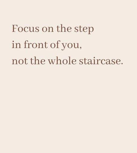 the words focus on the step in front of you, not the whole staircase