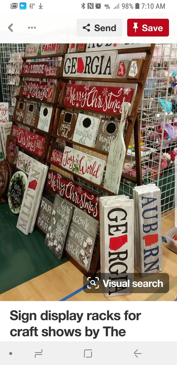 christmas signs are on display in a store