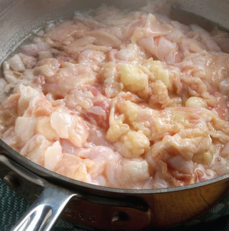 the food is being cooked in the pot on the stove top, ready to be eaten