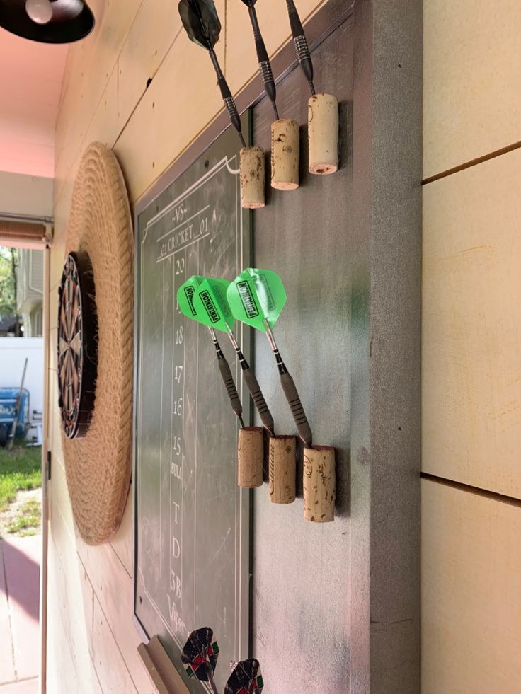 a chalkboard with several different electrical plugs attached to it