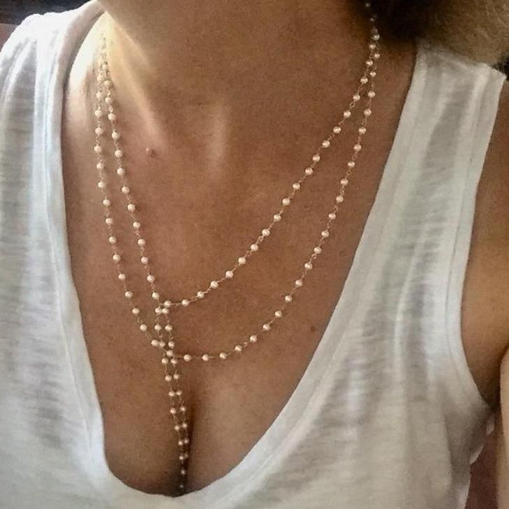 LA PERLA White Pearl Layering Necklaces, White Pearl Layered Necklace With Pearl Chain, White Pearl Chain Layered Necklace, Elegant Pearl Layered Necklace With Pearl Chain, Elegant Layered Pearl Necklace, Pearl White Necklaces For Layering, Elegant Double Strand Necklace With Pearl Charm, Pearl White Necklaces With Pearl Drop For Layering, Long Pearl Pendant Necklace For Parties