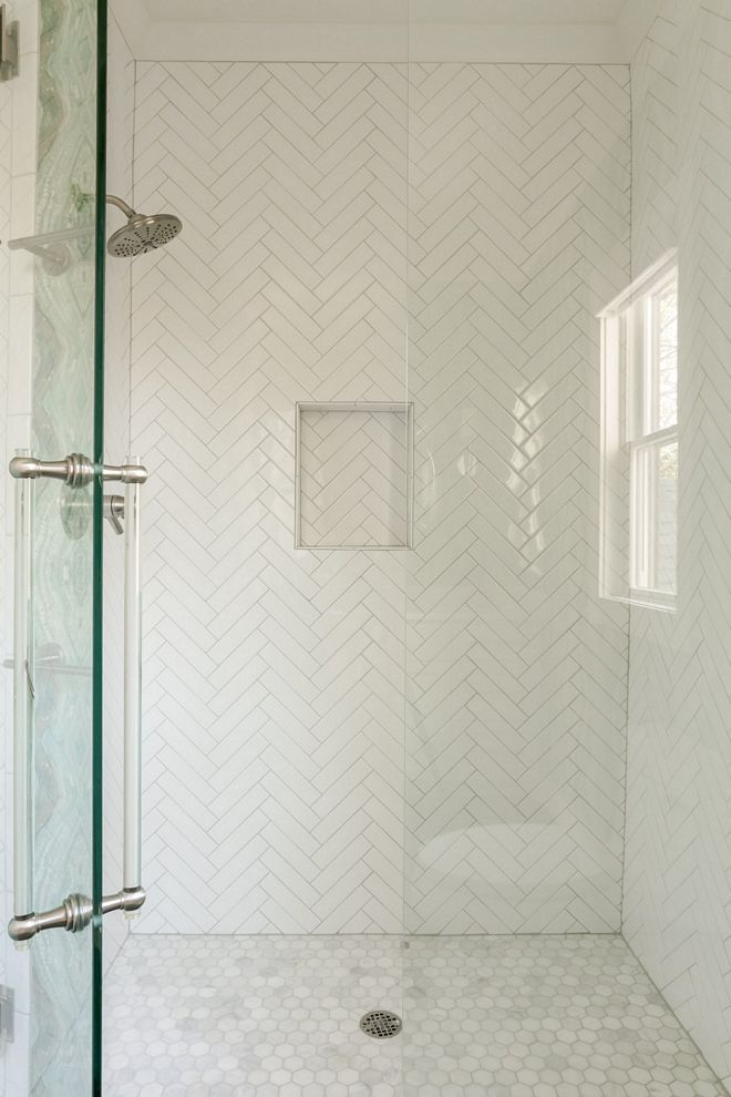 Chevron Shower Floor Tile, Bathroom Shower Herringbone Tile, White Herringbone Backsplash Bathroom, Herringbone Shower Tile With Niche, Coastal Shower Floor Tile, Subway Tile Shower Herringbone, Herringbone And Penny Tile Bathroom, Chevron Tile Bathroom Shower Walls, White Chevron Shower Tile