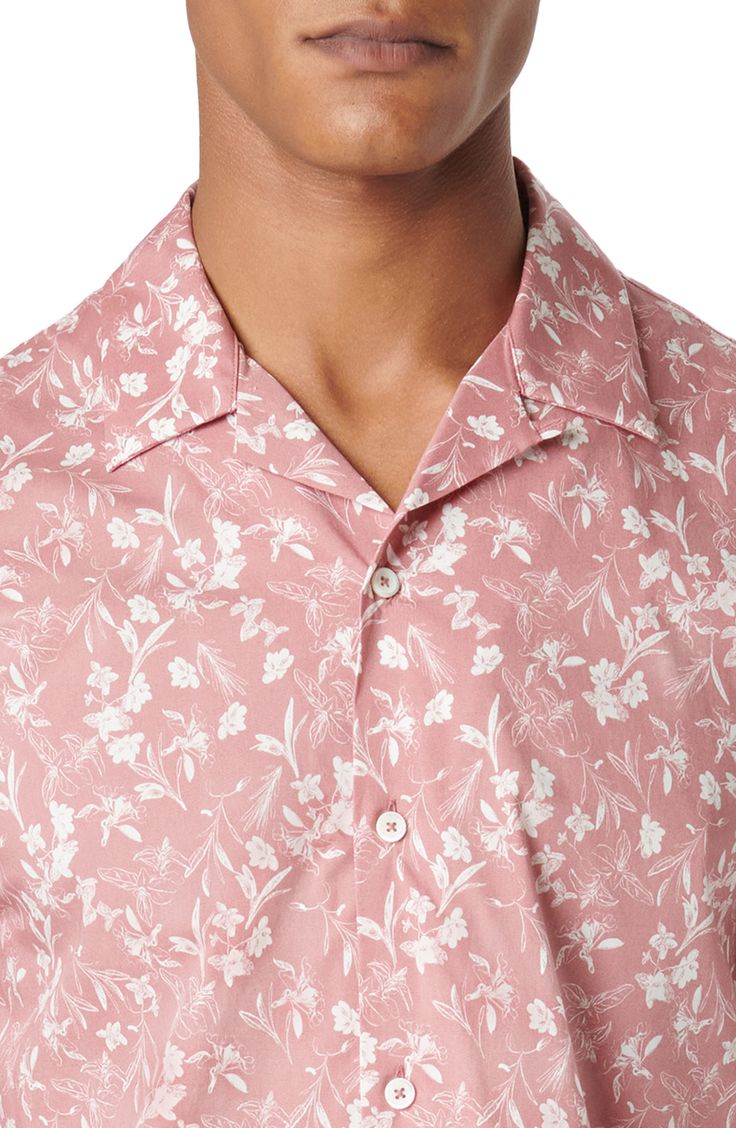 Scattered flowers invite tropical breezes in a camp shirt made of lightweight cotton with a touch of stretch and a casual, ready-to-relax fit. 29 1/2" length; 42" chest (size Medium) Front button closure Convertible collar Short sleeves 97% cotton, 3% elastane Dry clean or machine wash, dry flat Imported Tropical Floral Print Short Sleeve Shirt With Camp Collar, Printed Camp Collar Shirt For Spring, Fitted Printed Camp Shirt With Camp Collar, Spring Printed Shirt With Camp Collar, Fitted Camp Shirt With Printed Camp Collar, Casual Fitted Hawaiian Shirt For Spring, Fitted Casual Hawaiian Shirt For Spring, Pink Camp Shirt For Spring Vacation, Cotton Top With Hibiscus Print And Camp Collar