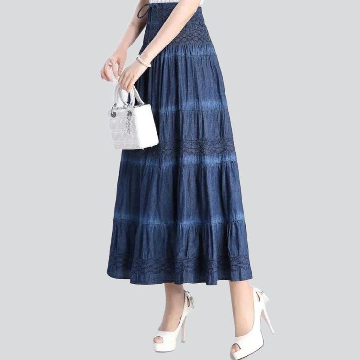 Take your urbane style to the next level with this 2023 Spring-Summer Collection Tiered Flare Denim Skirt! Crafted with premium-quality denim. this high-waisted. shape and flare skirt is patterned to hug your shape while offering maximum comfort. Featuring a unique damaged pattern. drawstrings closure and a stylish painted finish. this piece is perfect for the urban trendsetters looking to make a statement.Why You'll Love It Grunge-Inspired: Take a walk on the wild side with this rebellious-insp Trendy Flare Skirt For Spring, Denim Blue Flare Skirt For Spring, Spring Flare Denim Blue Skirt, Spring Denim Blue Flare Skirt, Spring Flared Cotton Skirt, Flared Denim Skirt For Summer, Casual Flared Dark Wash Denim Skirt, Summer Non-stretch Denim Skirt, High Waist Non-stretch Summer Skirt