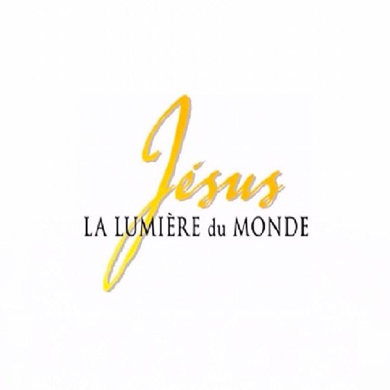 the logo for jesus la lumiere du monde, which is written in gold