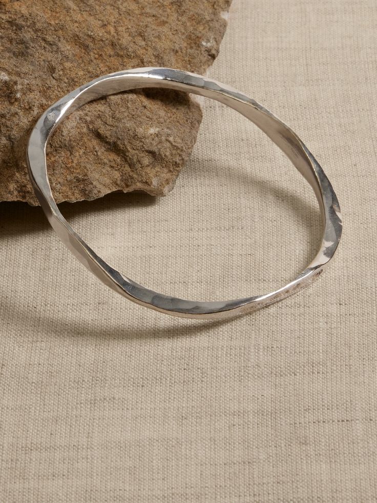 Heirloom Bangle | Aureus + Argent | Banana Republic Adjustable Artisan Hand Forged Bangle, Adjustable Hand Forged Artisan Bangle, Adjustable Artisan Handcrafted Bangle, Artisan Nickel-free Bangle, Artisan Oxidized Adjustable Jewelry, Unique Hammered Bangle As Gift, Hammered Silver Brass Bracelets, Silver Hammered Brass Bracelets, Adjustable Hand Cast Bangle