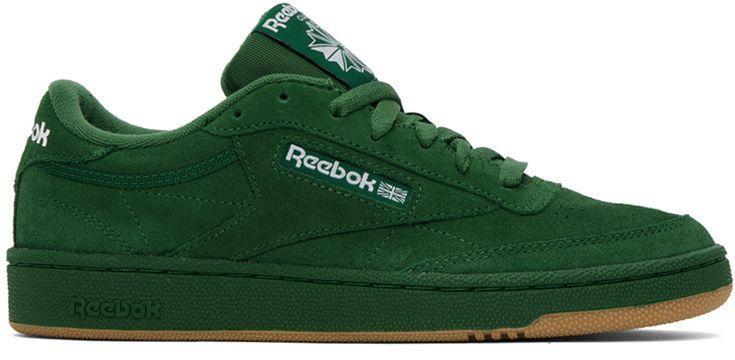 Low-top suede sneakers in green. · Perforated detailing at toe · Lace-up closure · Logo flag at padded tongue · Padded collar · Inset logo patch at outer side · Logo embossed at heel counter · Terrycloth lining · Treaded rubber sole Supplier color: Dark green/White/Gum Club C 85, Reebok Classics, Club C, Reebok Classic, Suede Sneakers, Terry Cloth, Luxury Streetwear, Low Top, Patch Logo