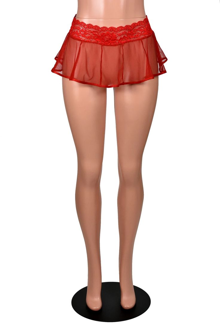 Mannequin wearing 9" long red mesh flared micro mini skirt. Skirt has a red lace waistband with scalloped edge. Sheer Mesh Mini Skirt, Fitted Mesh Mini Length Bottoms, Red Stretch Mini Length Skort, Red Stretch Mini Skort, Red Stretch Skort Mini Length, Red Stretch Mini Length Bottoms, Red Stretch Mini-length Bottoms, Stretch Red Mini Bottoms, Red Stretch Mini Bottoms