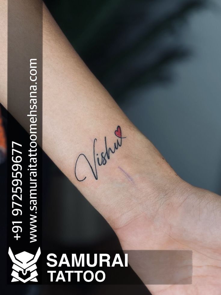 a person's arm with a tattoo that says visiku on it and the word i love you written in cursive writing