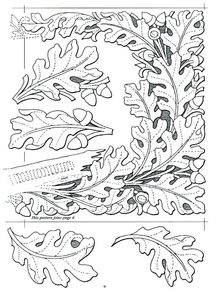 an intricate design with leaves and acorns