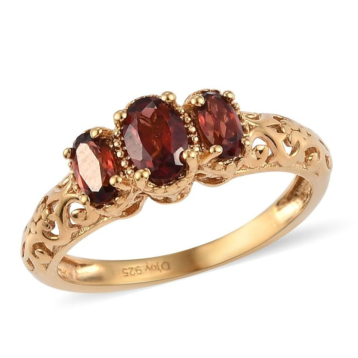 three stone ring in yellow gold