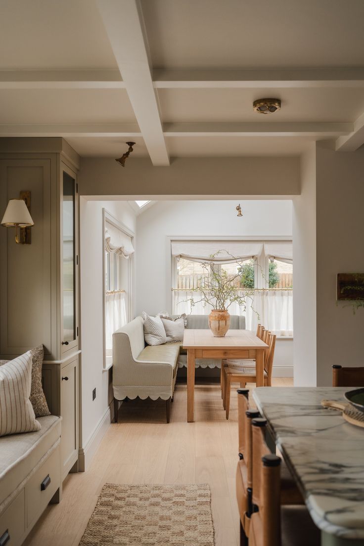 a living room and dining area in a house