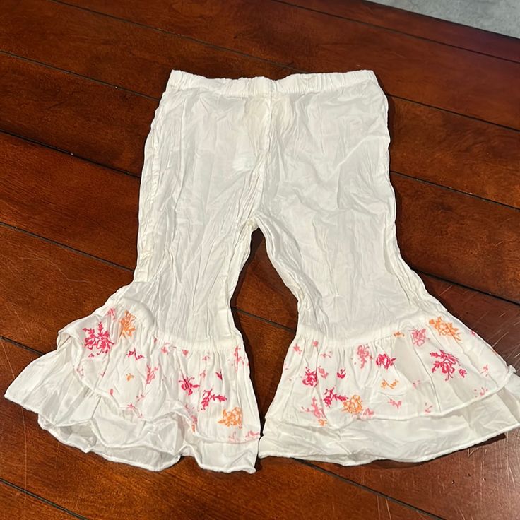 Nwt Naartjie White Lawn Whispey Fancy Pants Bell Bottoms Size L 6 Years White Cotton Bloomers With Elastic Waistband, Stretch Bottoms For Spring, Cute White Summer Pants, Casual Ruffled Bottoms For Playtime, White Bloomers With Elastic Waistband For Spring, Spring Stretch Cotton Bloomers, Spring White Bloomers With Elastic Waistband, White Long Pants Sets For Spring, Casual Ruffle Bottoms For Playwear