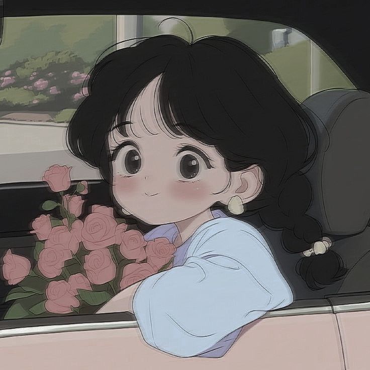 a woman sitting in the back seat of a car with flowers