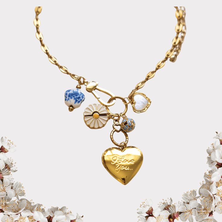 Discover the elegance and charm of our Personalized 18K stainless steel Charm Necklace, designed to reflect your unique style. This exquisite piece features multiple customizable pendants, making it the perfect accessory for any occasion. Item Details: Material: 18k gold plated stainless steel Chain necklace Tarnish + water resistant Pendant:18k gold plated stainless steel/Brass/Zircon/ Ceramic bead/blue eye bead Chain length: Chain length: 16inches+3(extenttion chain) Gold-tone Metal Charm Necklace, Metal Charm Necklaces With Adjustable Chain For Mother's Day, Gold Metal Charm Necklaces With Heart Charm, Gold-tone Chain Charm Necklace For Gift, Metal Charms With Chain For Gifts, Metal Chain Charms For Gifts, Metal Charm Necklace As A Gift, Elegant Stainless Steel Charm Necklace, Metal Heart Charm Necklace For Anniversary