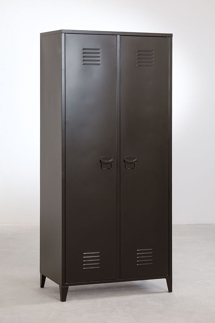 a tall metal locker sitting on top of a white floor