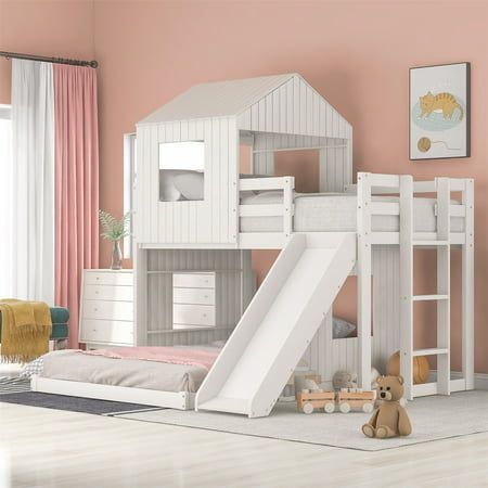 a child's bedroom with a white bunk bed and slide in the middle, pink walls