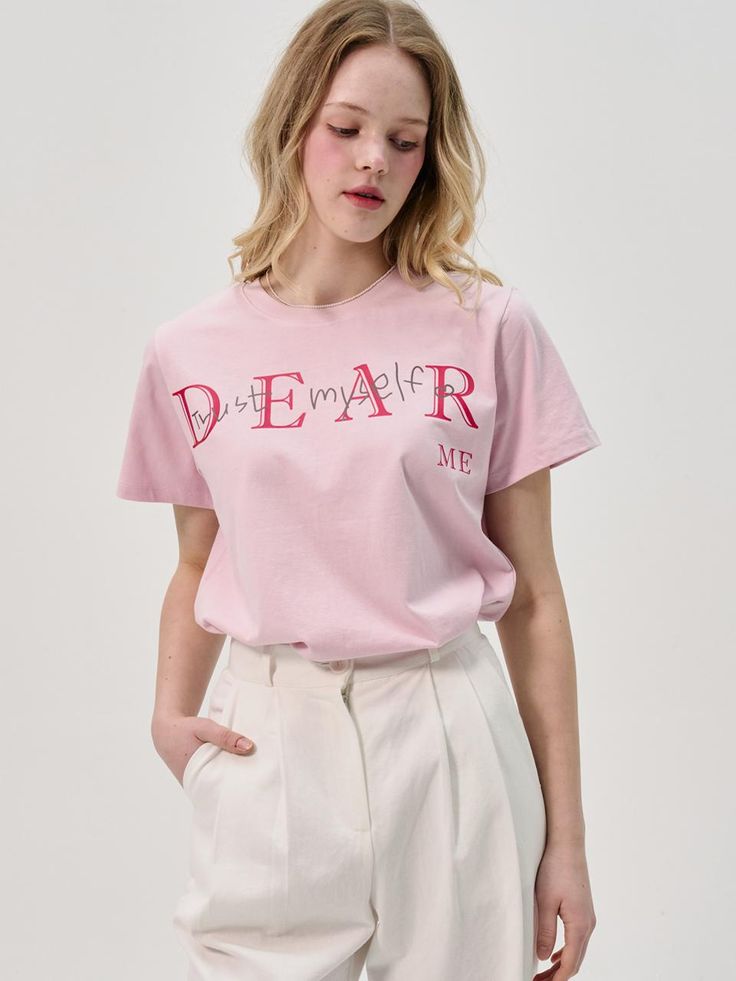 SORRY TOO MUCH LOVE is a brand that proposes romantic and unique clothing with the concepts of sweet, funky, and elegant.- Basic fit short-sleeve t-shirt- Can be styled as a standalone statement piece- Lightweight 30-count premium cotton with minimal transparency Pink Relaxed Fit T-shirt With Letter Print, Pink Slogan T-shirt With Short Sleeves, Feminine Cotton Short Sleeve T-shirt, Casual Pink Slogan T-shirt, Feminine Relaxed Fit T-shirt For Spring, Trendy Pink T-shirt With Text Print, Feminine Pink Crew Neck T-shirt, Cute Pink T-shirt With Text Print, Pink Cotton Tops With Letter Print