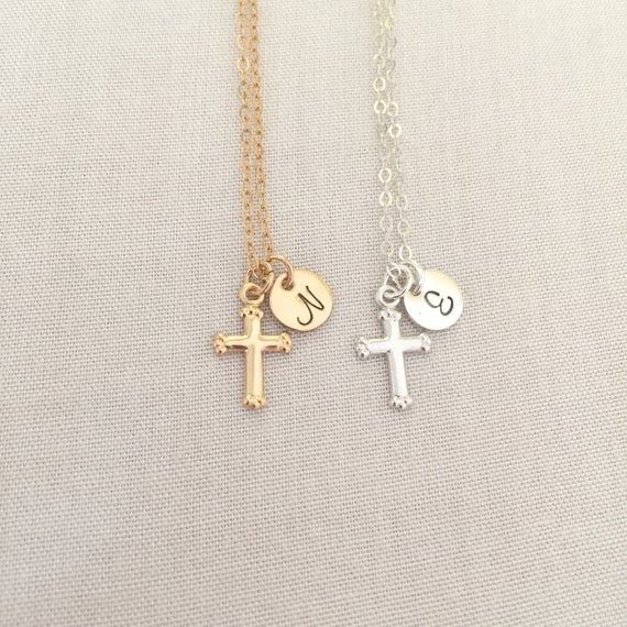 Hand Stamped Cross Necklace, Baby Christening Necklace, Personalized Baptism Necklace, First Communion Gift, Baby Boy Necklace, Simple CrossAvailable in Sterling Silver and 14K Gold FilledSpecification. All component is Sterling Silver or 14K Gold Filled. Disc size 7mm. Cross size 8.5 x 11mm. Comes in a satin pouch. Length includes jump ring and claspPLEASE leave instruction of initial in the note box at checkout.ie. NIMPORTANT:Usually jewellery in the pictures looks bigger than in reality.Pleas Silver Cross Jewelry For Confirmation, Silver Pendant Necklace For First Communion, Engraved Cross Necklace For First Communion, Engraved Silver Necklace For First Communion, Silver Engraved Necklace For First Communion, Silver Name Necklace With Cross Pendant, Dainty Cross Pendant Necklace For Baptism, Silver Cross Pendant Necklace With Name, Silver Cross Necklaces With Name Detail