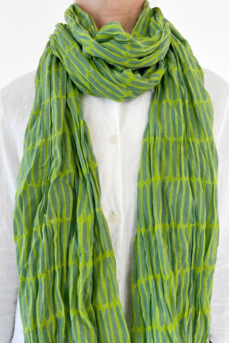 These 100% cotton scarves are the perfect accessory in any season. Experience the luxurious touch of soft, lightweight cotton scarves that add a splash of color to any outfit! From subtle patterns to bright, vibrant shades, these delicately crinkled cotton scarves will make you stand out — and do it in style. Transform your wardrobe with an order of these beautiful cotton scarves! They measure a generous 44 by 70 inches and can be easily styled in different ways. They come packaged twisted in a