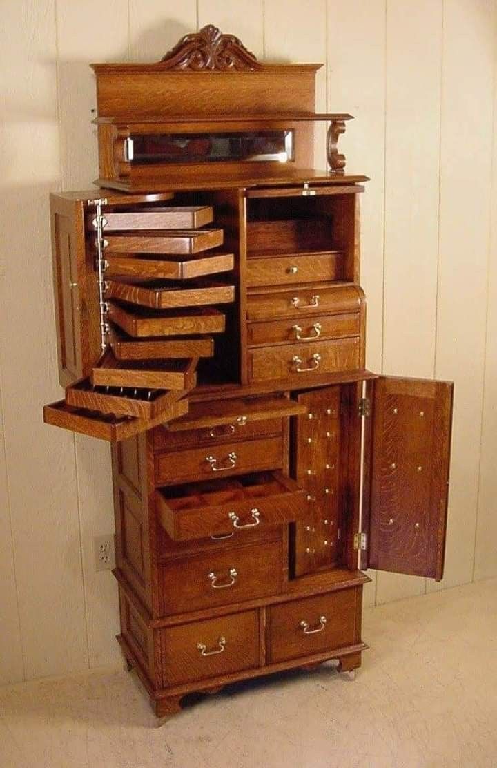 an old wooden dresser with many drawers