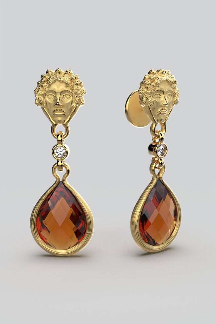 Experience the exquisite elegance of Italian craftsmanship with these stunning Oltremare Italian gold earrings. Handcrafted from 14k or 18k solid gold, these dangle drop earrings feature a radiant citrine gemstone, symbolizing success, positivity, and creativity, and are complemented by masterfully placed diamonds for an added touch of sparkle. Elevate your look with these timeless adornments, perfect for both special occasions and everyday wear. Make a statement with the radiance of Italian jewelry--own a piece that will last a lifetime. Embrace the heritage of Italian artistry and craftsmanship with Oltremare Italian gold earrings. Indulge in the warmth of Madeira Citrine as it gracefully combines with the refined craftsmanship of Italian artisans, creating a perfect harmony in our Apoll Elegant Teardrop Citrine Earrings, Luxury Classic Citrine Earrings, Luxury Citrine Round Earrings, Luxury Yellow Gold Garnet Earrings, Luxury Yellow Citrine Earrings, Italian Jewelry, Citrine Stone, Black Gift Boxes, Classy Jewelry