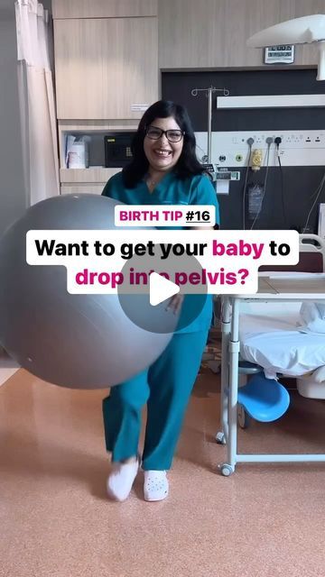 a woman standing in a hospital room holding a large object with the words birth tip 216 want to get your baby to drop in - pel