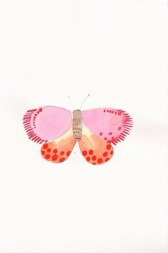 a pink and orange butterfly flying in the sky with dots on it's wings