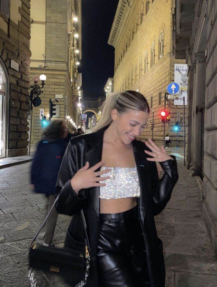 📸: @nitsanraiter cute sparkly zara top night out outfit - black leather jacket, aritzia pants, jacquemus bag New Year Outfit Parties, Sparkle Top Outfit, Top Brillante, Leather Pants Outfit Night, Sparkly Pants, Black Pants Outfit, Sparkly Outfits, Sparkle Outfit, Party Outfits Night