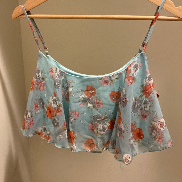 Never Worn, Still Has Original Tags. Bought From Mandees. Uk2la Blue Floral Crop Top Size L Light Blue Summer Crop Top, Casual Blue Cami Crop Top, Light Blue Cropped Summer Crop Top, Light Blue Cami Crop Top For Summer, Light Blue Summer Crop Top For Day Out, Summer Light Blue Cropped Top, Blue Cami Crop Top For Vacation, Light Blue Cami Crop Top For Spring, Light Blue Casual Beach Crop Top