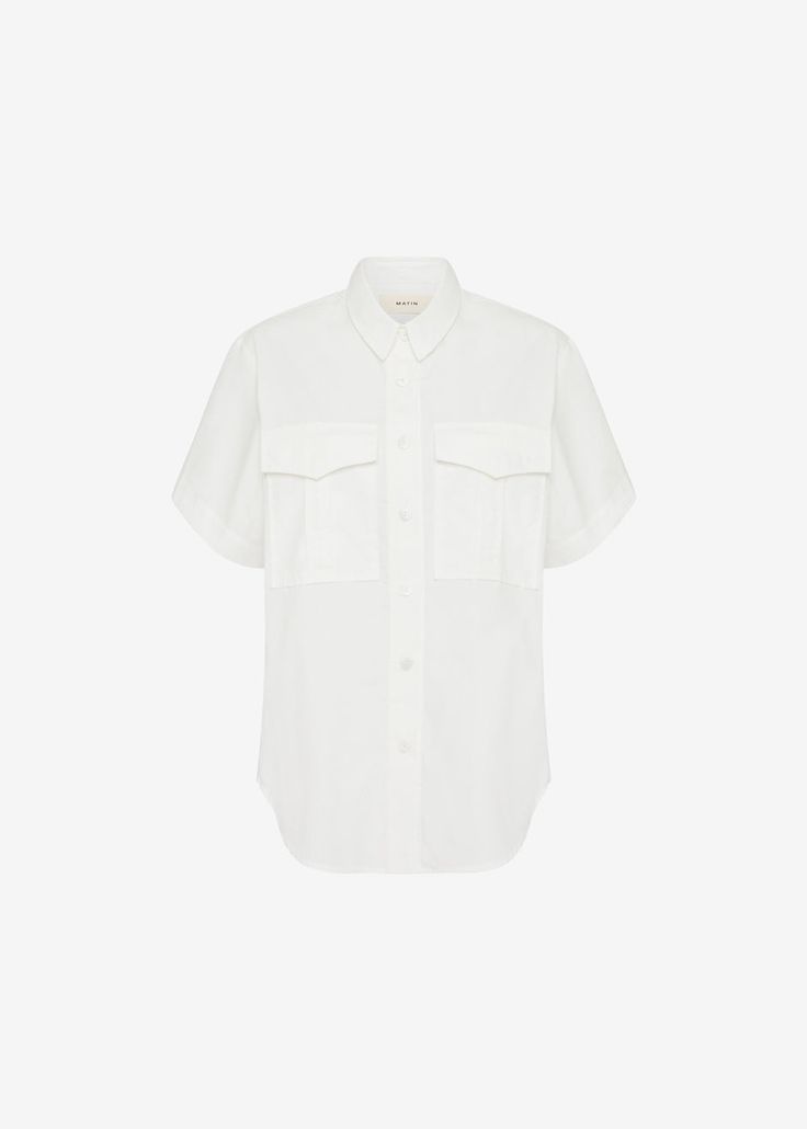 Color: White Lightweight cotton poplin Relaxed fit Straight collar Wide short sleeves Flap chest pleated pockets Front button closure Unlined 100% Cotton Cold Gentle Machine Wash By MATIN. Made and designed in Australia Paris Store, Denim Suit, Paris Woman, Pocket Shirt, Leather Texture, Swimwear Accessories, Cotton Poplin, Jumpsuit Dress, Lounge Wear