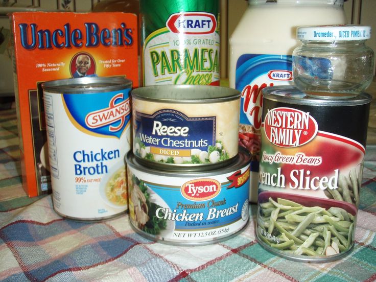 several canned food items are on a table