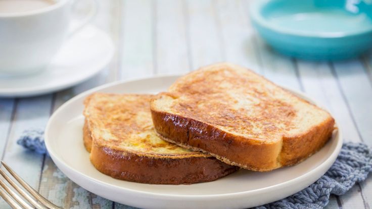 two pieces of toast on a white plate