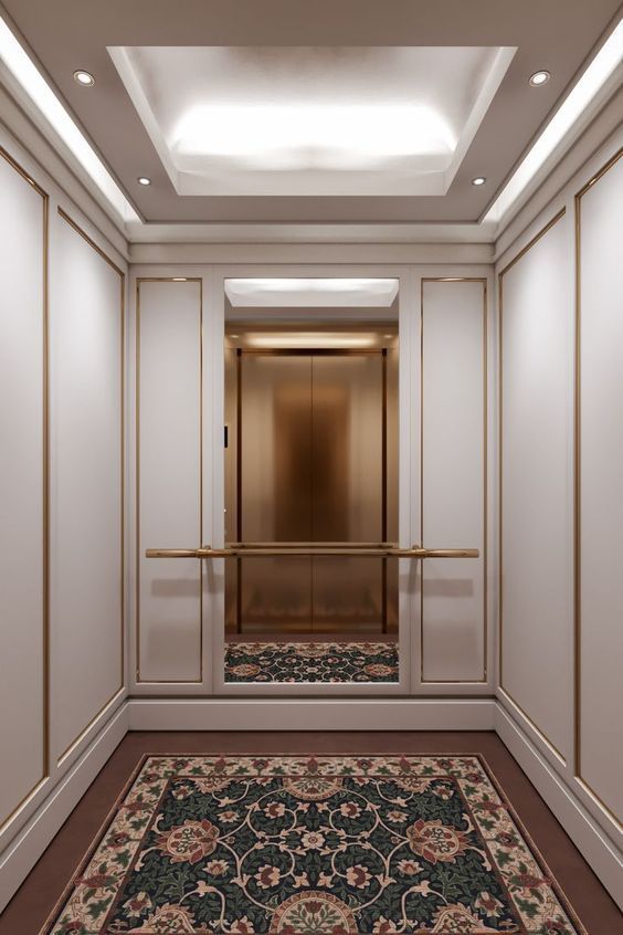 an empty hallway with a rug on the floor