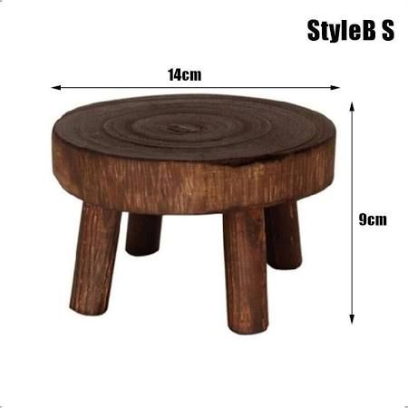 a wooden stool with measurements for the legs and foot rest on it's side