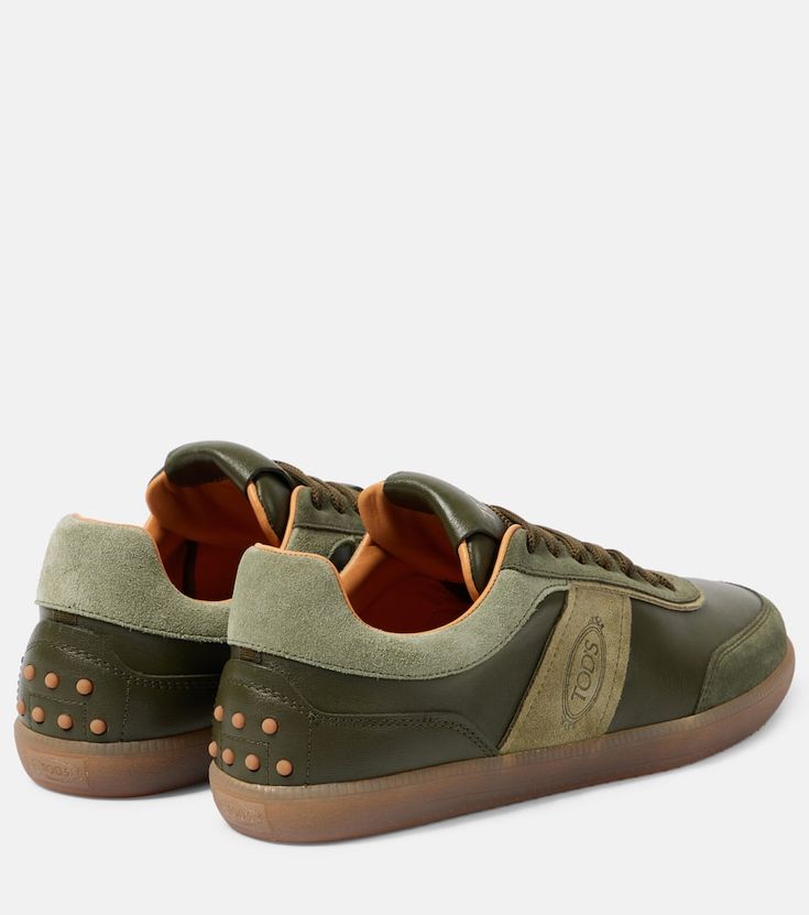 Find TOD'S Tabs Suede-trimmed Leather Sneakers on Editorialist. Upper: leather. Lining: leather. Sole: leather insole, rubber sole. Toe shape: round toe. Made in Italy. Includes: shoe box, dust bag, extra laces. Designer color name: Safari Sc + Felce. Closure: lace-up. Trim: suede. Green Leather Sneakers With Contrast Sole, Green Leather Sneakers With Round Toe, Calf Leather Sneakers With Branded Insole And Round Toe, Green Calf Leather Sneakers With Contrast Sole, Green Calf Leather Sneakers With Round Toe, Green Sneakers With Contrast Sole In Calf Leather, Green Calf Leather Sneakers With Rubber Sole, Designer Sneakers With Rubber Sole And Round Toe, Green Casual Calf Leather Sneakers