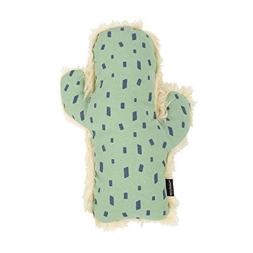 a green cactus shaped pillow with blue dots on it's back and white fur