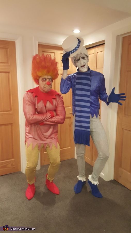 two people in costumes standing next to each other